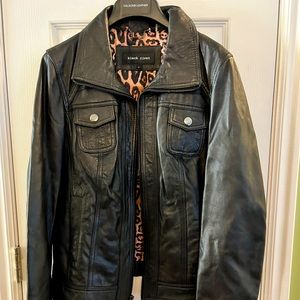 Womens Black Rivet genuine leather jacket. Size large